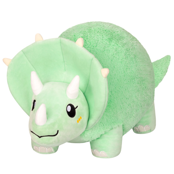 Triceratops Squishable plush, green with three horns, smiling face, and yellow cheeks.
