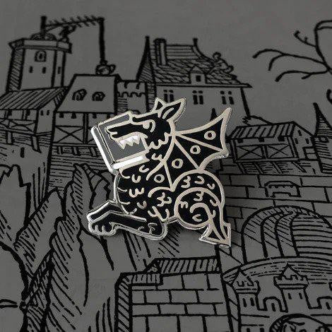 Book Wyrm enamel pin, also called Book Dragon, available in four colors.