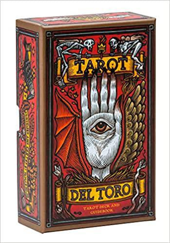 Red Tarot Del Toro box set with illustrated tarot deck featuring skeletal figures, eye on a hand, and bat wing designs.