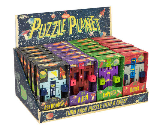 Puzzle Planet space puzzles packaged in cubes: astronaut, alien, emperor, and robot variants in a display box.