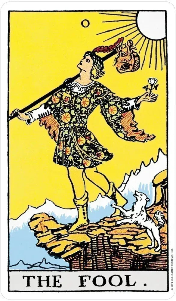 The Rider-Waite® Tarot Deck featuring a youth with a knapsack, white rose, and dog by a cliff.