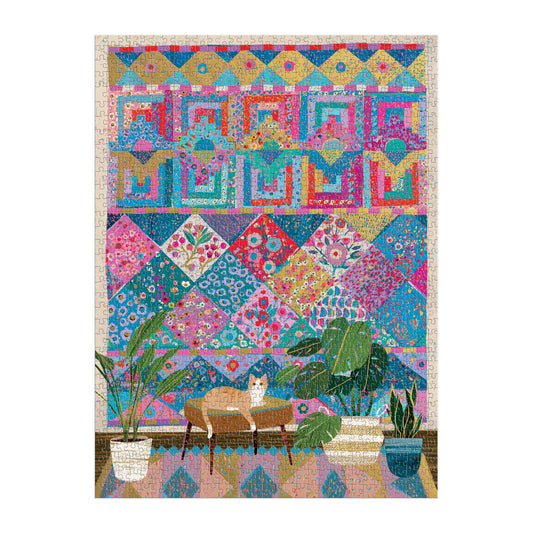 Victoria Ball Quilter’s Corner 1000 Piece Foil Puzzle with a cat lounging near plants and a bench in front.