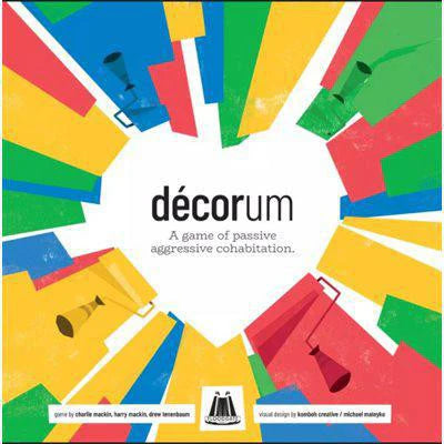Decorum cooperative board game box with geometric shapes and a white heart on the cover.