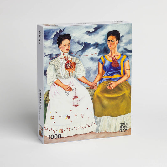 The Puzzles Frida Kahlo Two Fridas 1000-piece jigsaw puzzle featuring The Two Fridas painting on a white background.