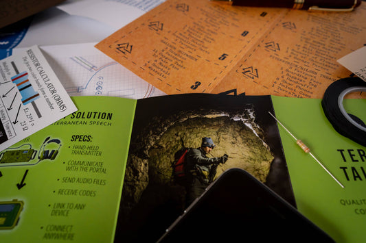 Family Secrets Series Episode 7 - Buried with resistor calculator, treasure map, and device blueprints.
