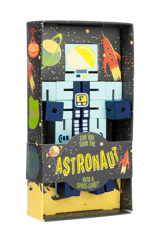 Toy astronaut robot with puzzles of varying difficulty levels in a colorful space-themed box.