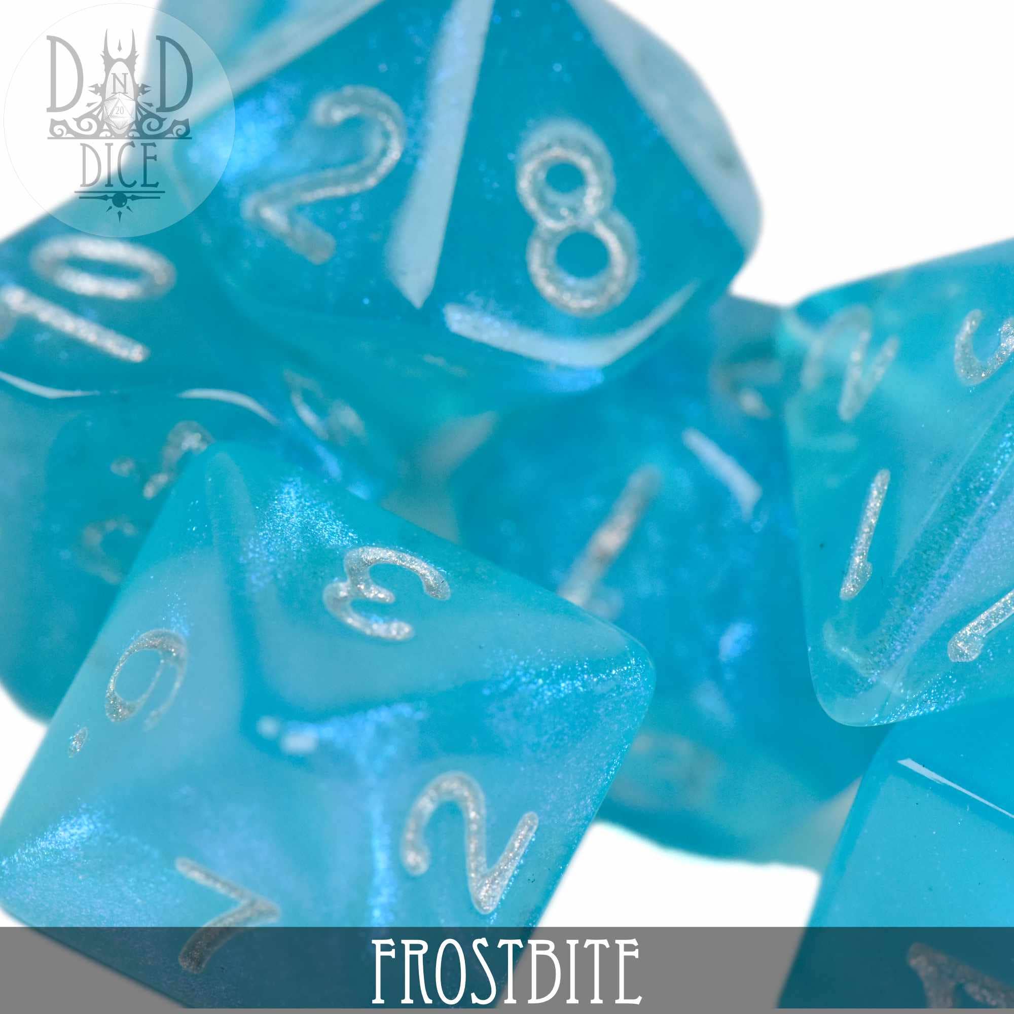 Translucent blue acrylic DND dice with silver numbers from the Frostbite Glitter set.