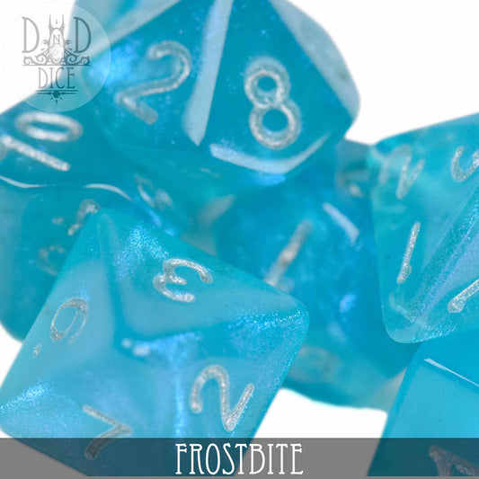 Translucent blue acrylic DND dice with silver numbers from the Frostbite Glitter set.