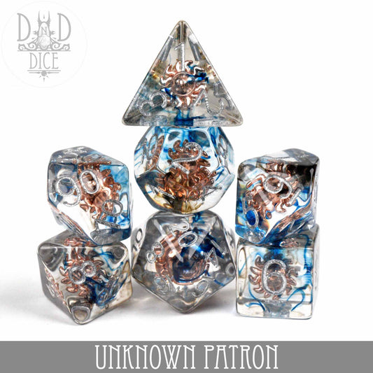 Unknown Patron 7-piece translucent resin dice set with blue and copper swirls, for tabletop gaming.