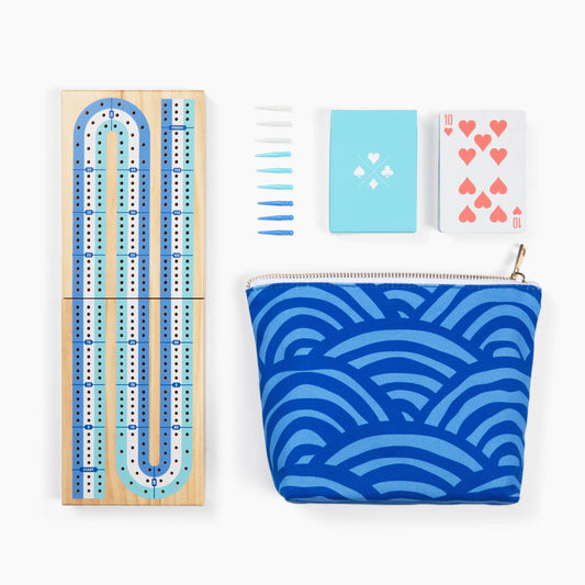 Canvas Classics Cribbage set with colored pegs, playing cards, and blue zip pouch.