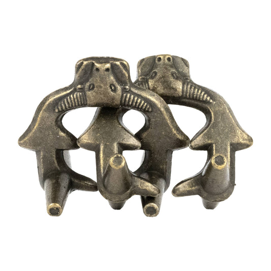 The True Genius Viking Forge 3-piece puzzle set with two connected stylized bronze animal sculptures.