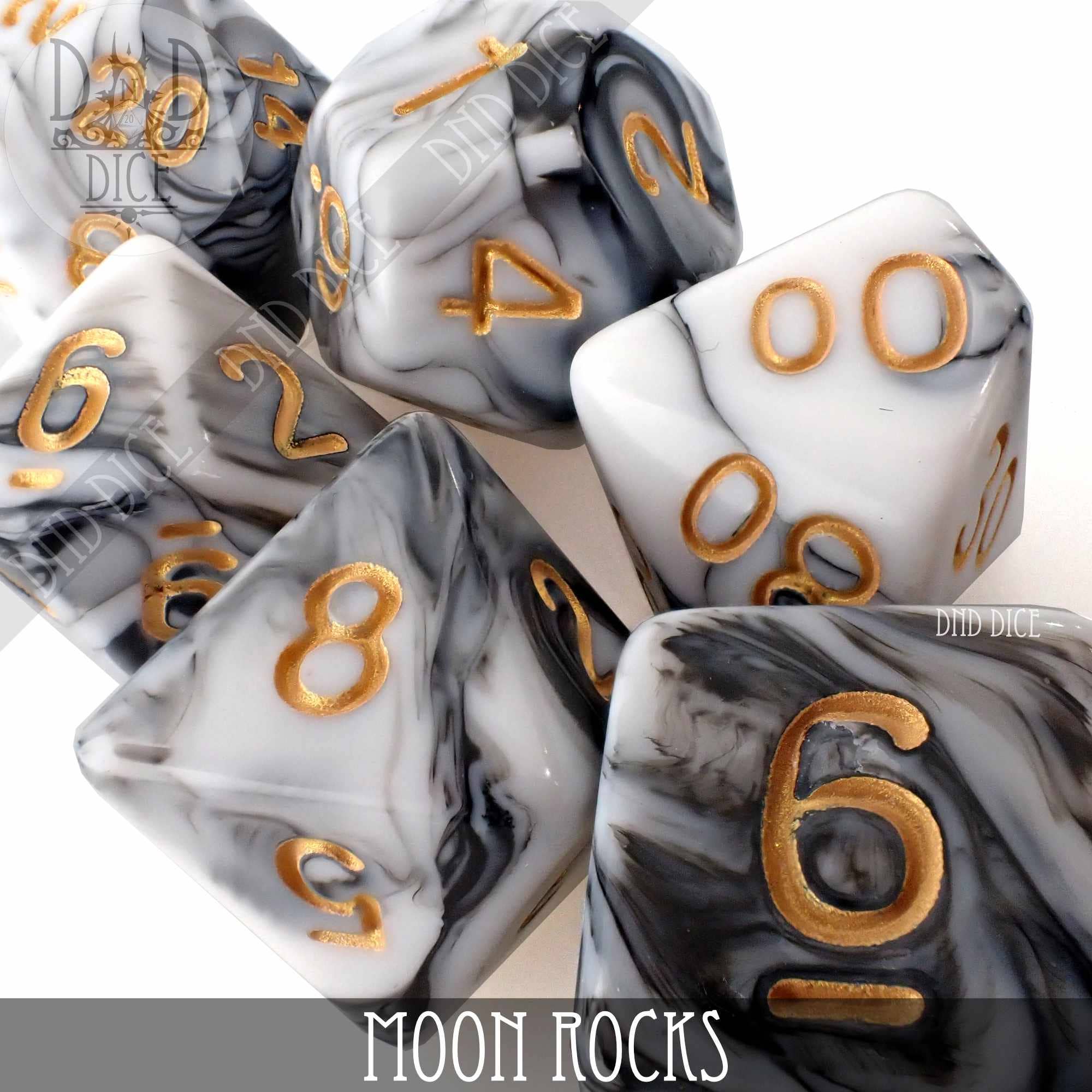 Moon Rocks 7 or 11 polyhedral dice set, marbled black and white with gold numbers, in a standard bottle.
