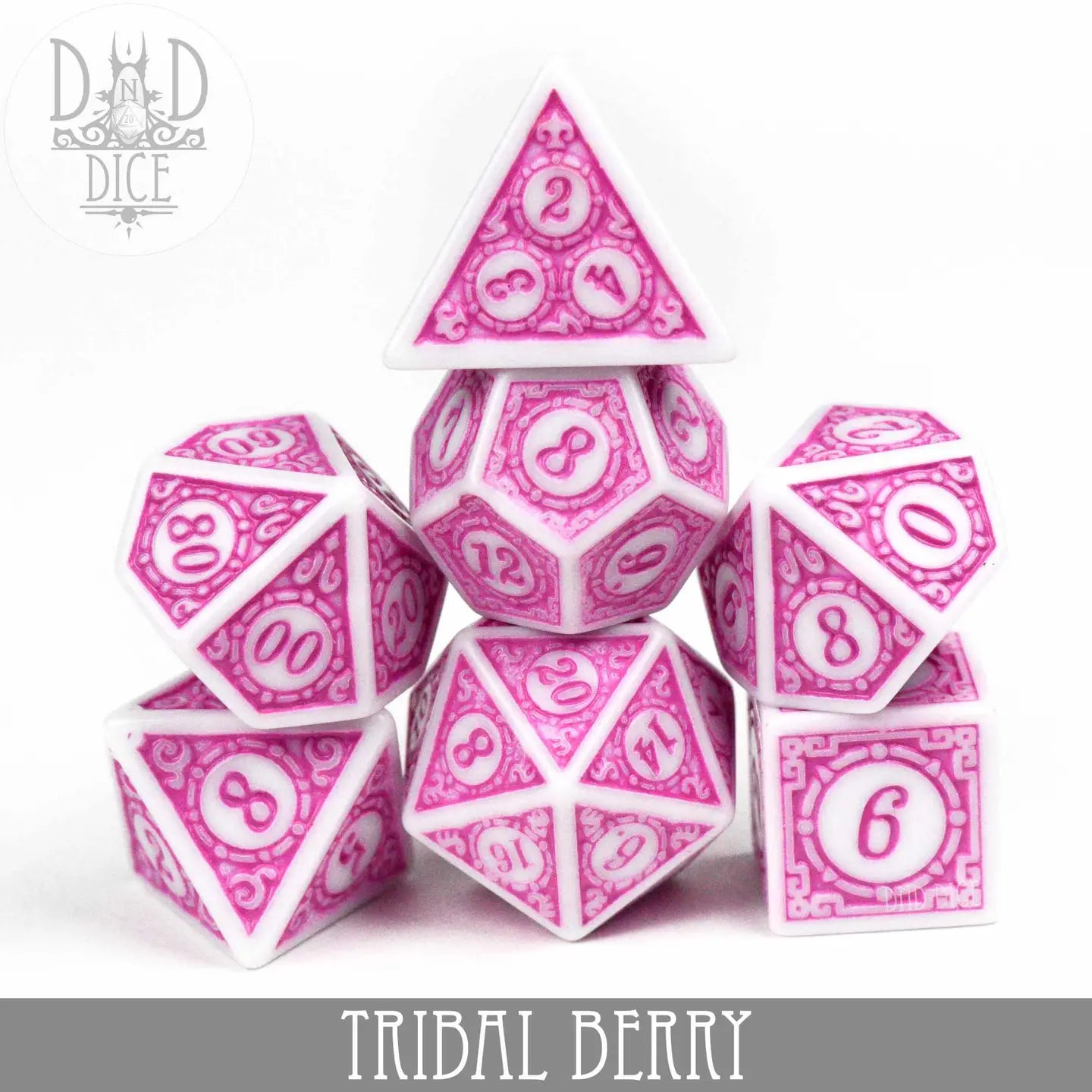 Tribal Berry Dice Set, 7-piece pink and white polyhedral dice with intricate designs for tabletop gaming.