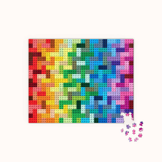 LEGO Rainbow Bricks Puzzle with rainbow gradient design and several LEGO pieces next to the completed puzzle.