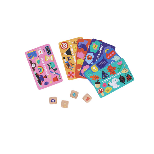 Wheres Your Head At? game with colorful cards and four wooden dice.