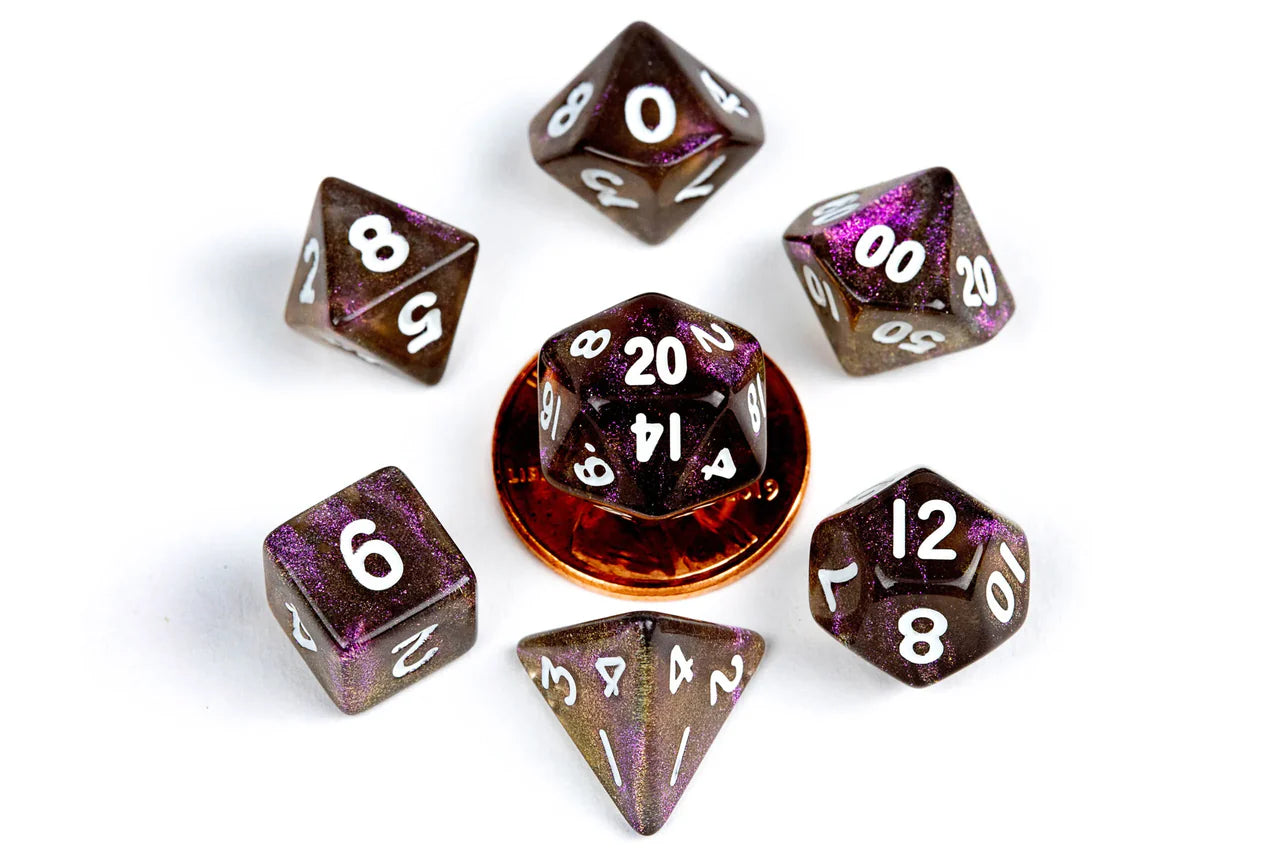 Stardust Supervolcano 10mm Mini Poly Dice Set, six glittery dice shown with a penny for scale on a white background.