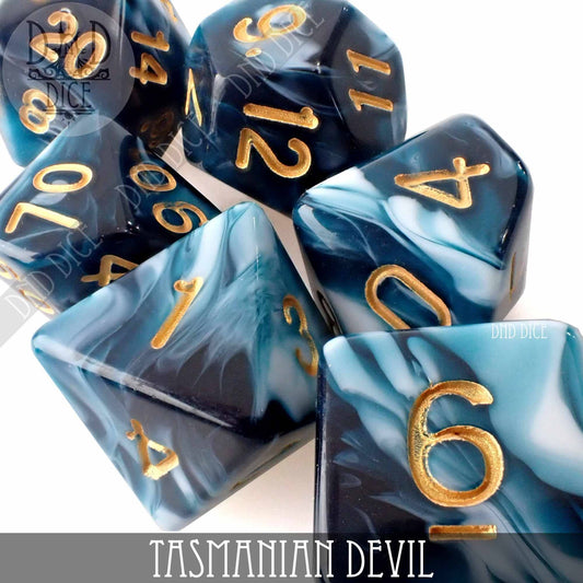 Tasmanian Devil 7 or 11 polyhedral dice set, blue and white marbled with gold numbers.