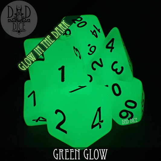Green Glow in the Dark acrylic 7-dice set with black numbers for D&D, displayed on a black background.