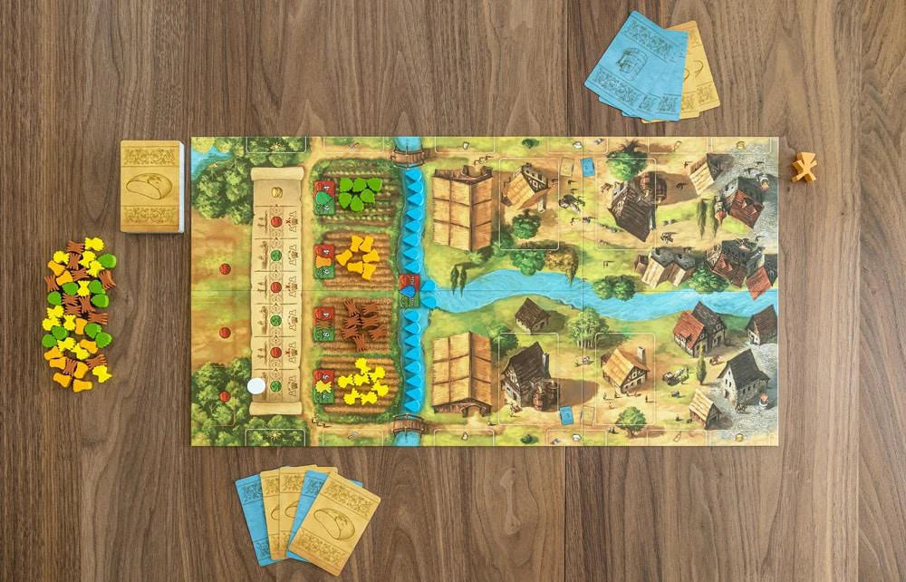 Beer & Bread board game with cards and tokens displayed on a wooden table.