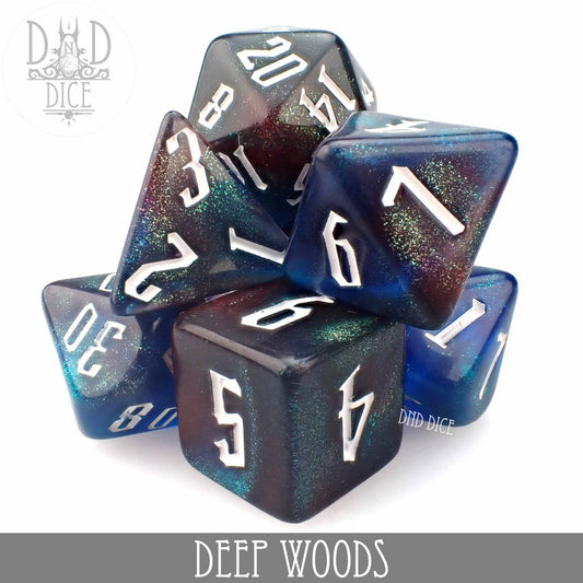 Deep Woods acrylic dice set, glittery blue, green, and purple with white numbers.