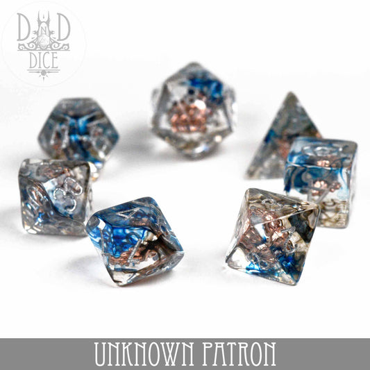 Unknown Patron 7-dice set in blue and silver resin with metallic flecks.