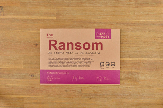 Brown envelope labeled Escape Room | Puzzle Game | Board Game | The Ransom.