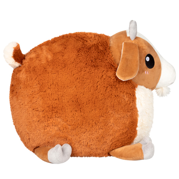 Round brown and white baby goat plushie with horns, ears, and hooves.