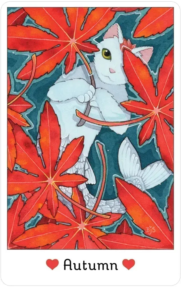 Fairy Cats Deck and Book Set featuring a white fairy cat with red leaves and “Autumn” text with hearts.