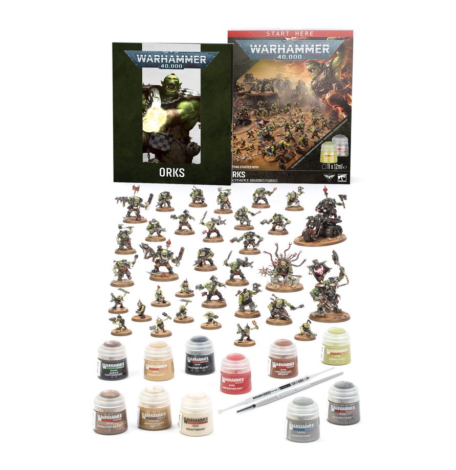 Warhammer 40,000 Getting Started with Orks set with painted miniatures, paints, brush, and rulebook.