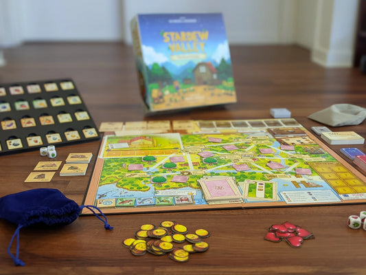 Stardew Valley The Board Game set up for community center play with cards, tokens, dice, and pieces.