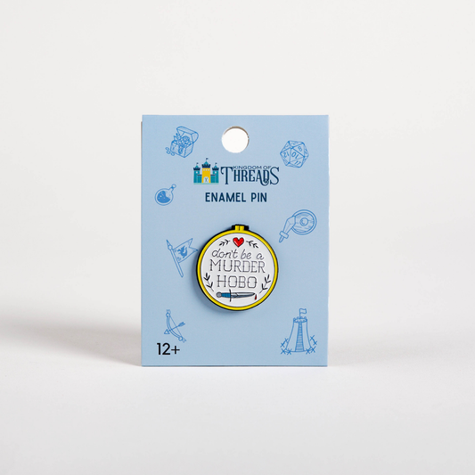 Don’t Be a Murder Hobo enamel pin with TTRPG art and text, displayed on a blue card.