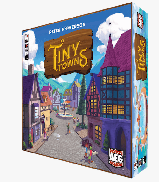 Tiny Towns board game box featuring medieval buildings and villagers in a town square.