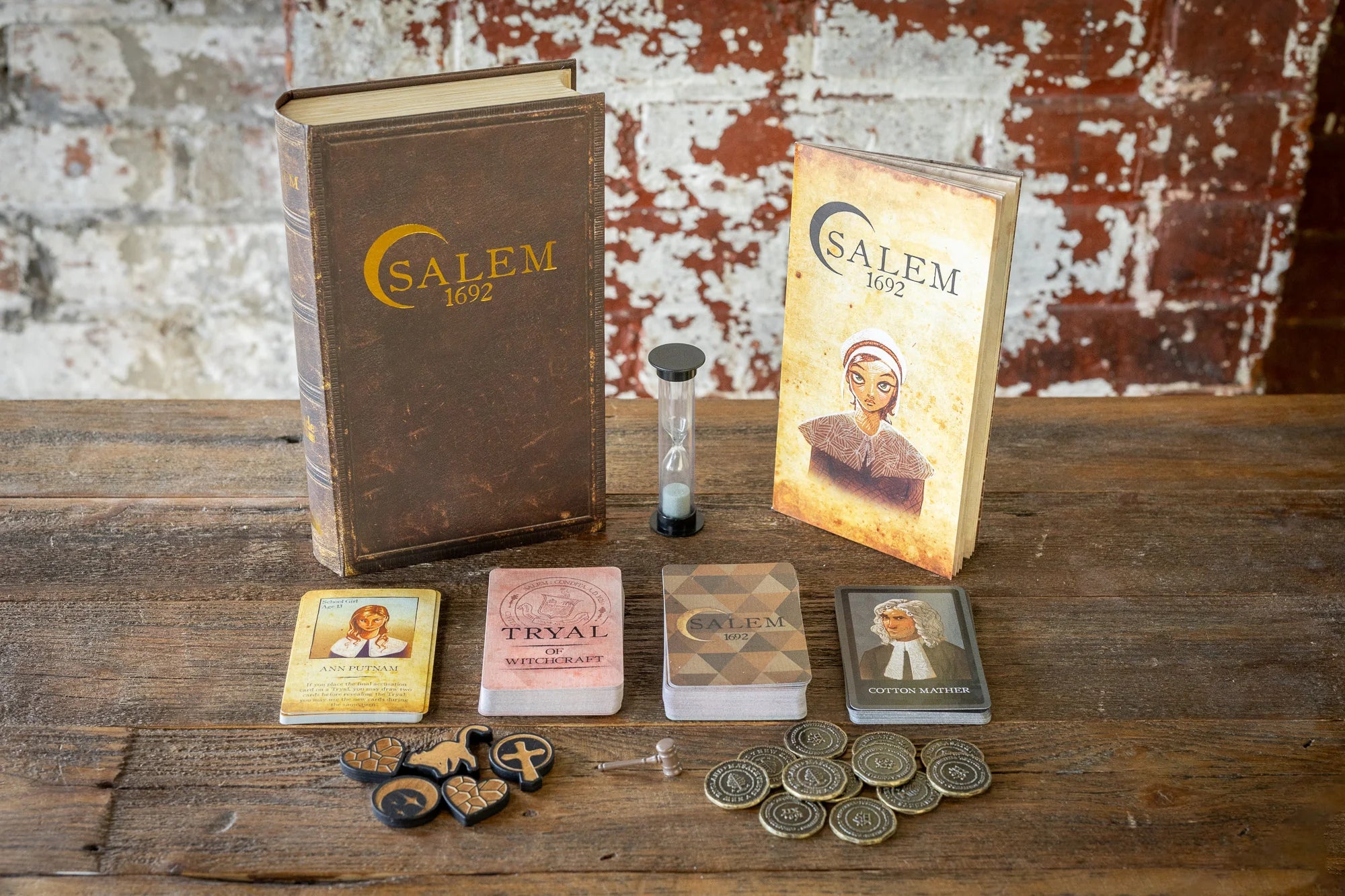 Salem 1692 social deduction party card game.