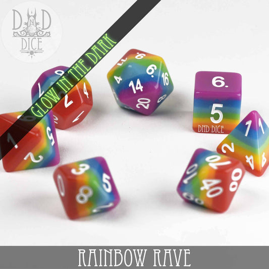 Rainbow Rave (Glow) 7-piece resin dice set with rainbow stripes, white numbers, and glow-in-the-dark accents.