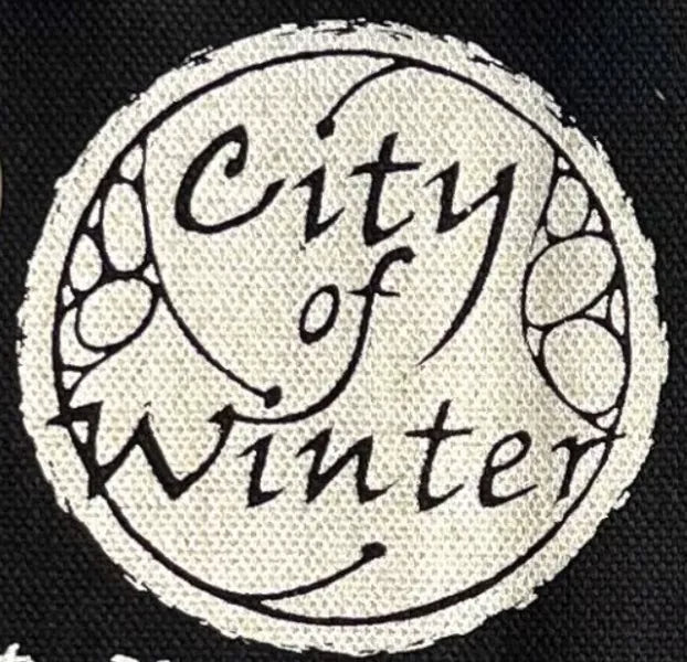 Circular City of Winter logo in stylized script on white, for Free RPG Day RPG Room (Age 16+).