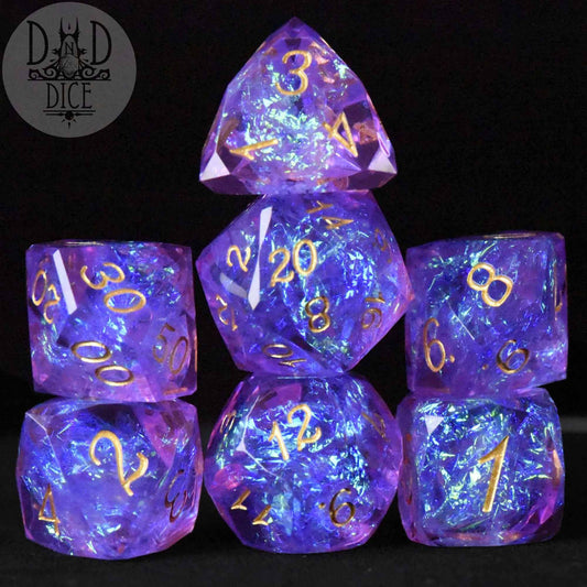 Set of six Crown Jewels Imperial dice in purple resin with gold numbers.