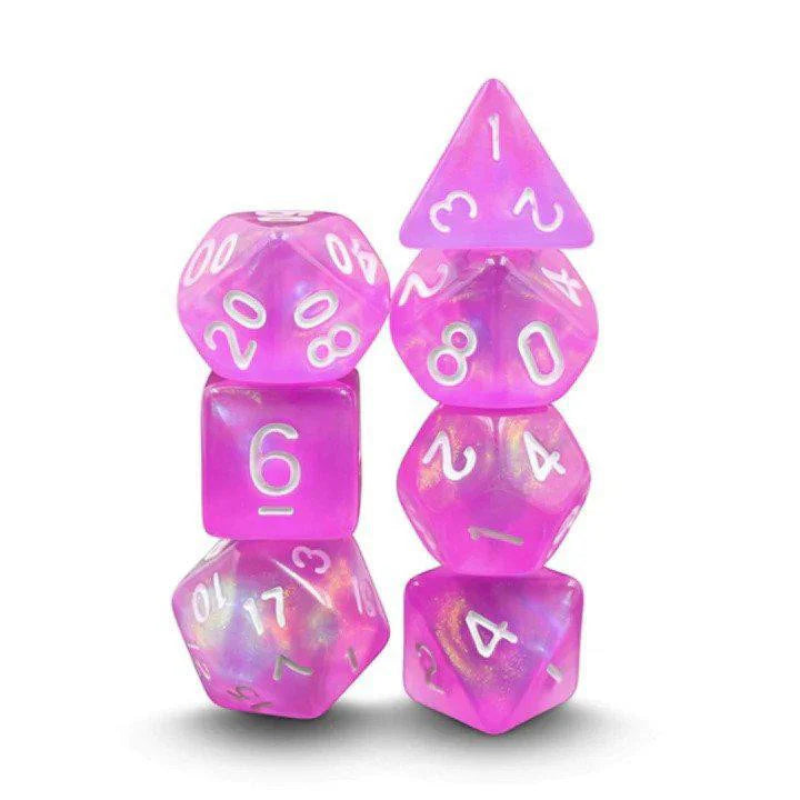 Dream in Bloom RPG Dice Sets, two stacks in pink and iridescent colors on a white background.