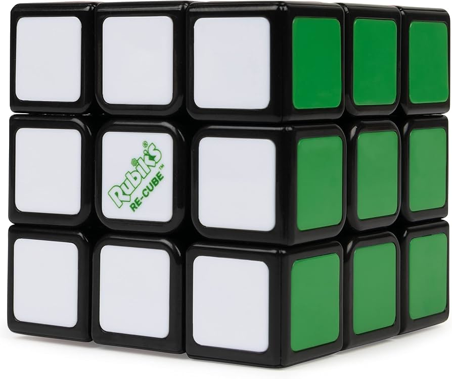 Rubiks Re-Cube puzzle with white and green stickers on a black recycled plastic frame.