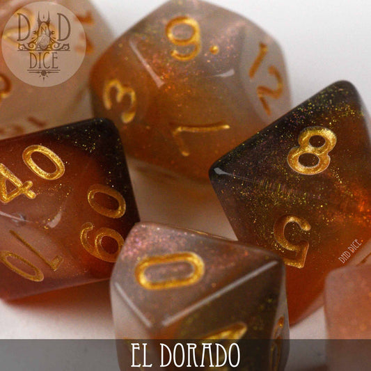 El Dorado dice set in gold and brown acrylic with gold numbers; product name visible at the bottom.