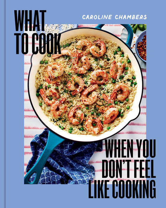 What To Cook When You Dont Feel Like Cooking cookbook cover featuring a skillet of shrimp and rice.