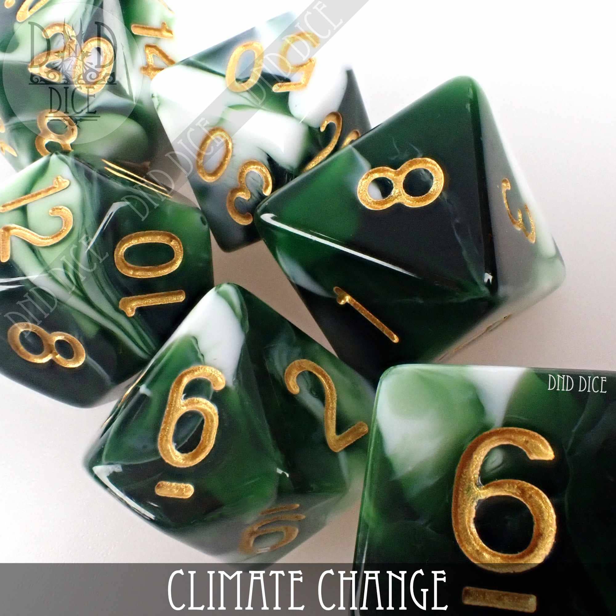 Green and white swirled acrylic dice set with gold numbering, Climate Change 7 or 11 variant.