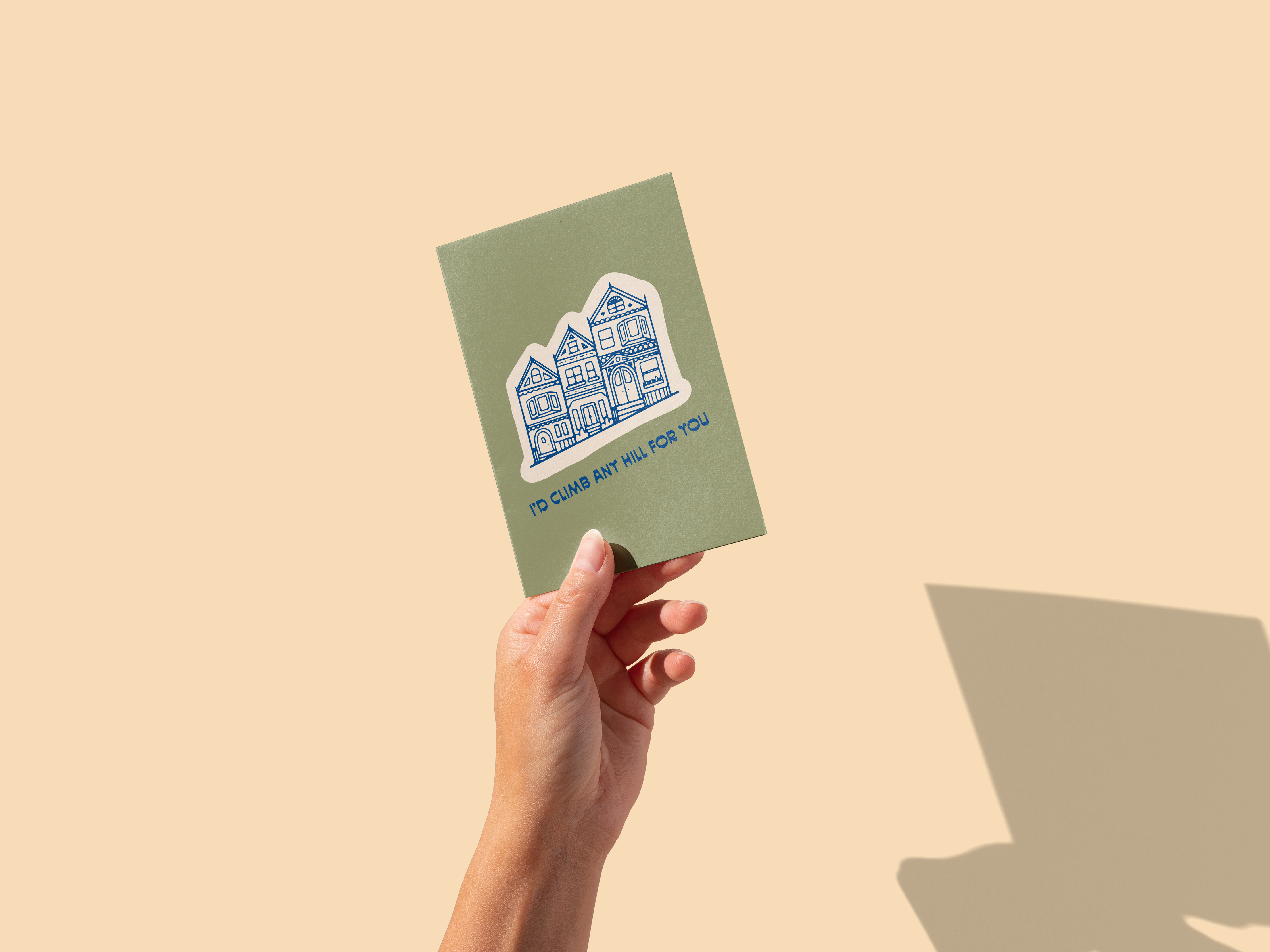 Id Climb Any Hill For You greeting card with San Francisco homes by Aleisha Nelson, held in a hand.