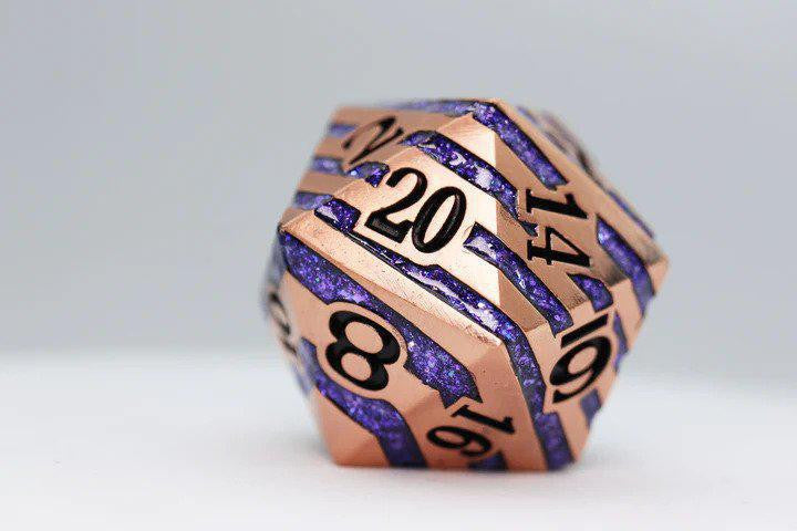 35mm metal D20 die, copper with purple mica and black engraved numbers.