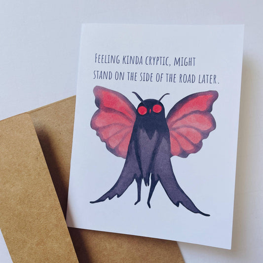 Mothman Cryptic Humor Card with a red-eyed moth illustration and the text Feeling kinda cryptic today.