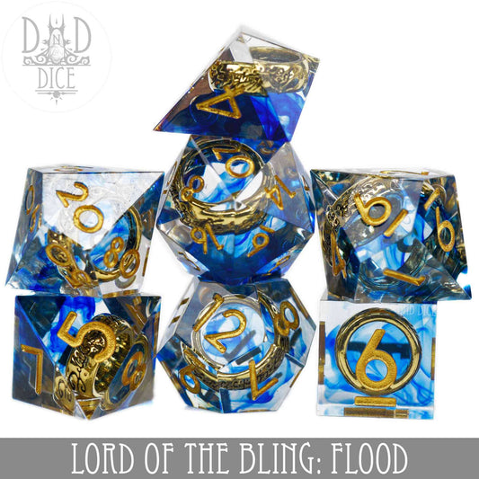 Lord of the Bling: Flood - Set of 7 handmade blue and clear resin dice with gold numbers and rings.