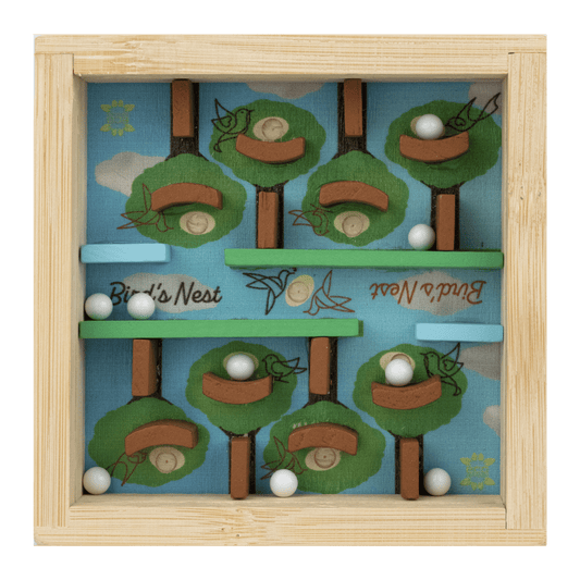 Birds Nest Bamboo puzzle with white balls on a blue surface.
