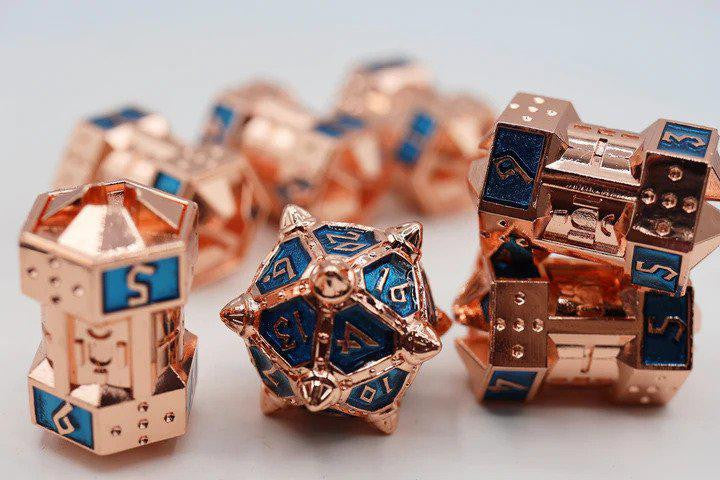 Copper Lit Space CCG Metal Dice Set—copper dice with blue numbers, includes spiked d20, displayed on white surface.
