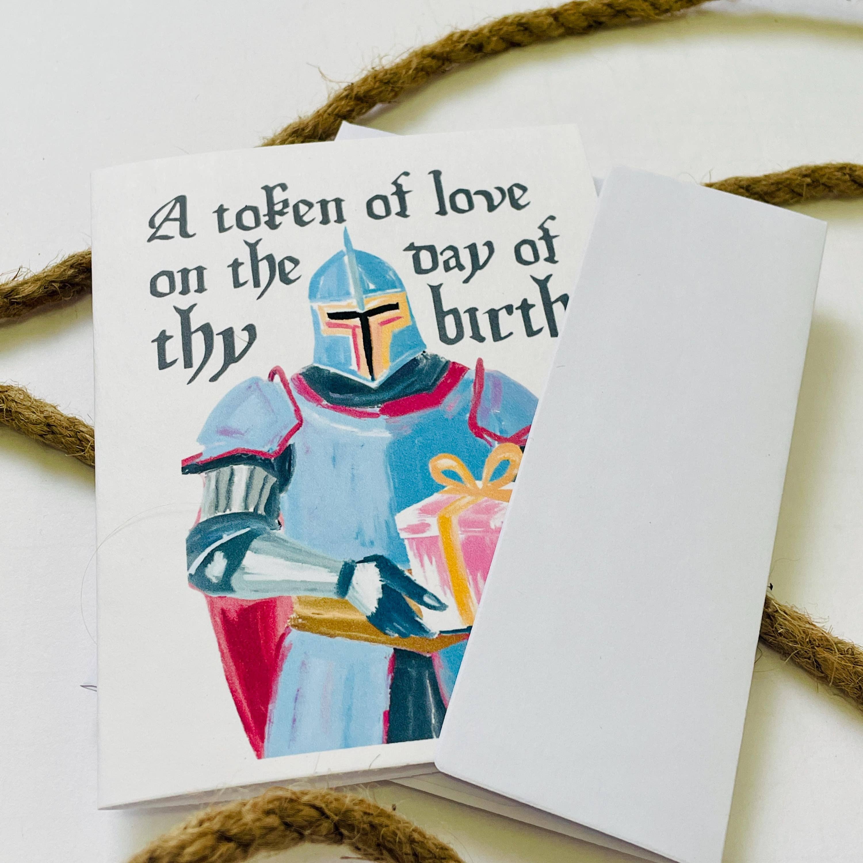 Medieval & Renaissance Role-Playing Birthday Card featuring a knight holding a gift and the message: A token of love on thy birth.