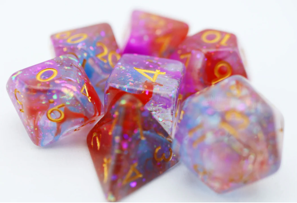 The Dawning RPG Dice Set includes colorful resin polyhedral dice with gold numbers.