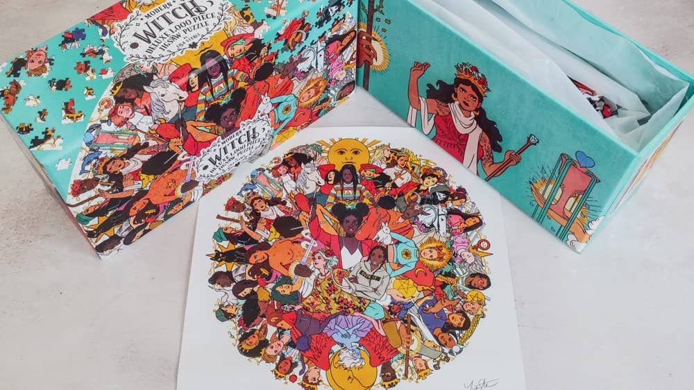 Modern Witch Deluxe 1,000 Piece Jigsaw Puzzle with illustrated box and circular print featuring diverse women.